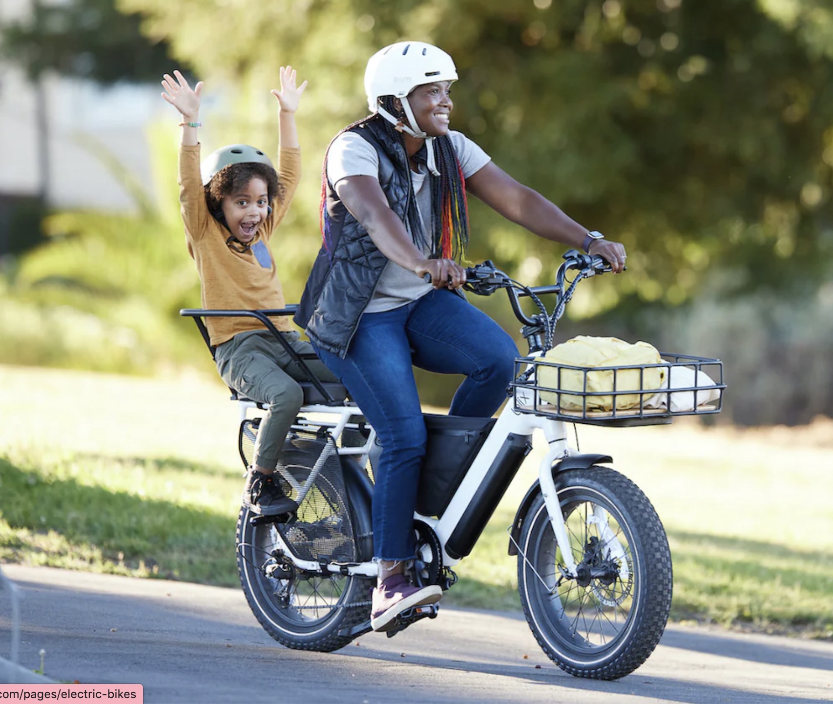 Two models riding a Blix ebike