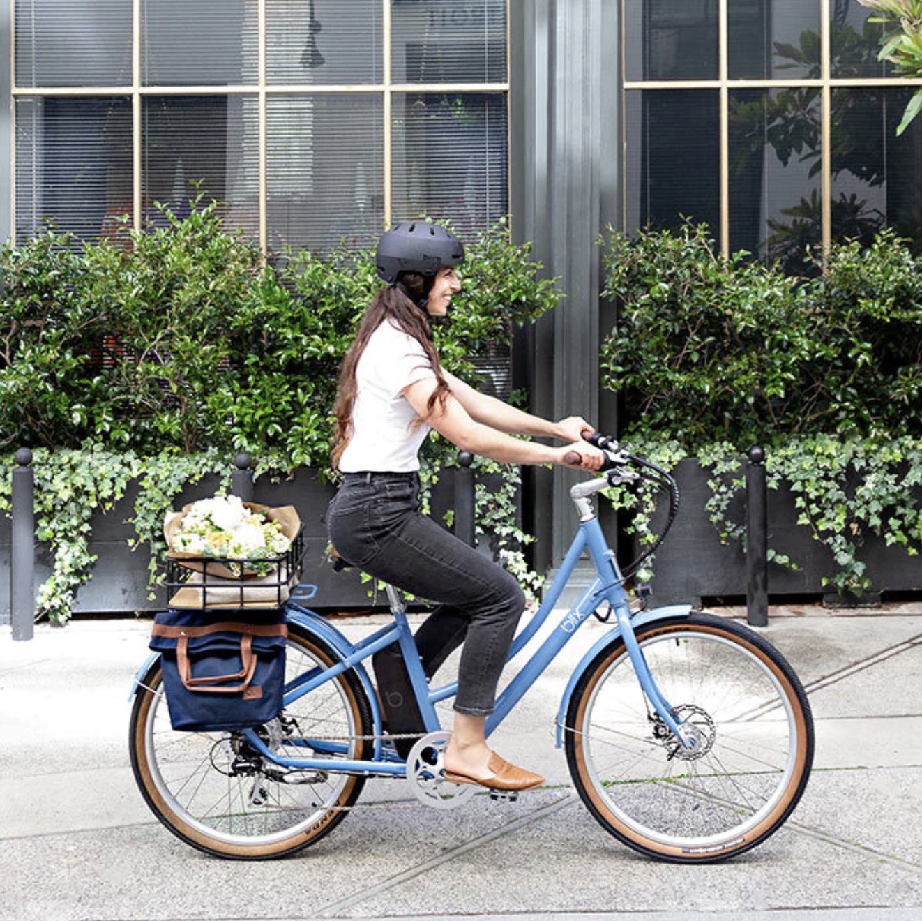 A model riding a Blix ebike