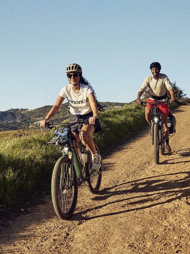 Two models riding Cannondale ebikes