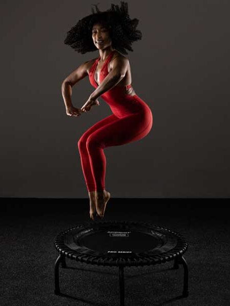 A model jumps on a rebounder trampoline from Jumpsport
