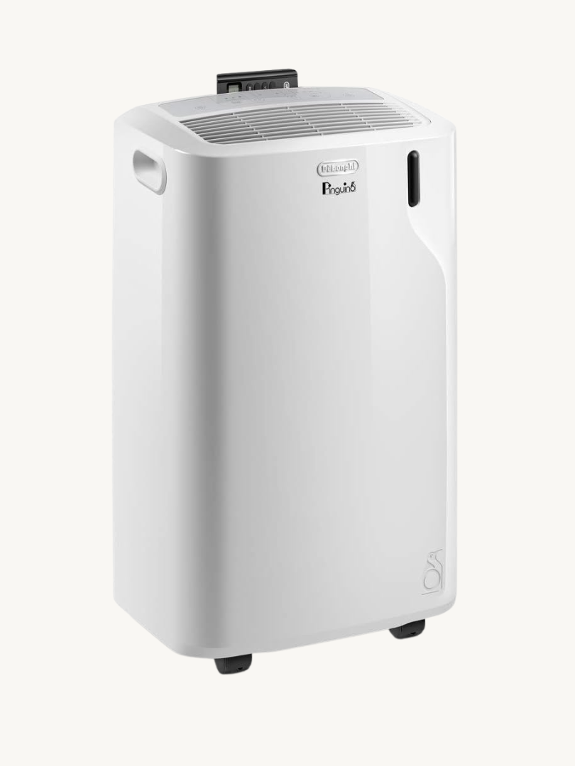 A white portable air conditioner with side handles, a ventilation grill on top, and small wheels at the base for mobility—perfect for cooling your home gym after an intense session with massage guns.
