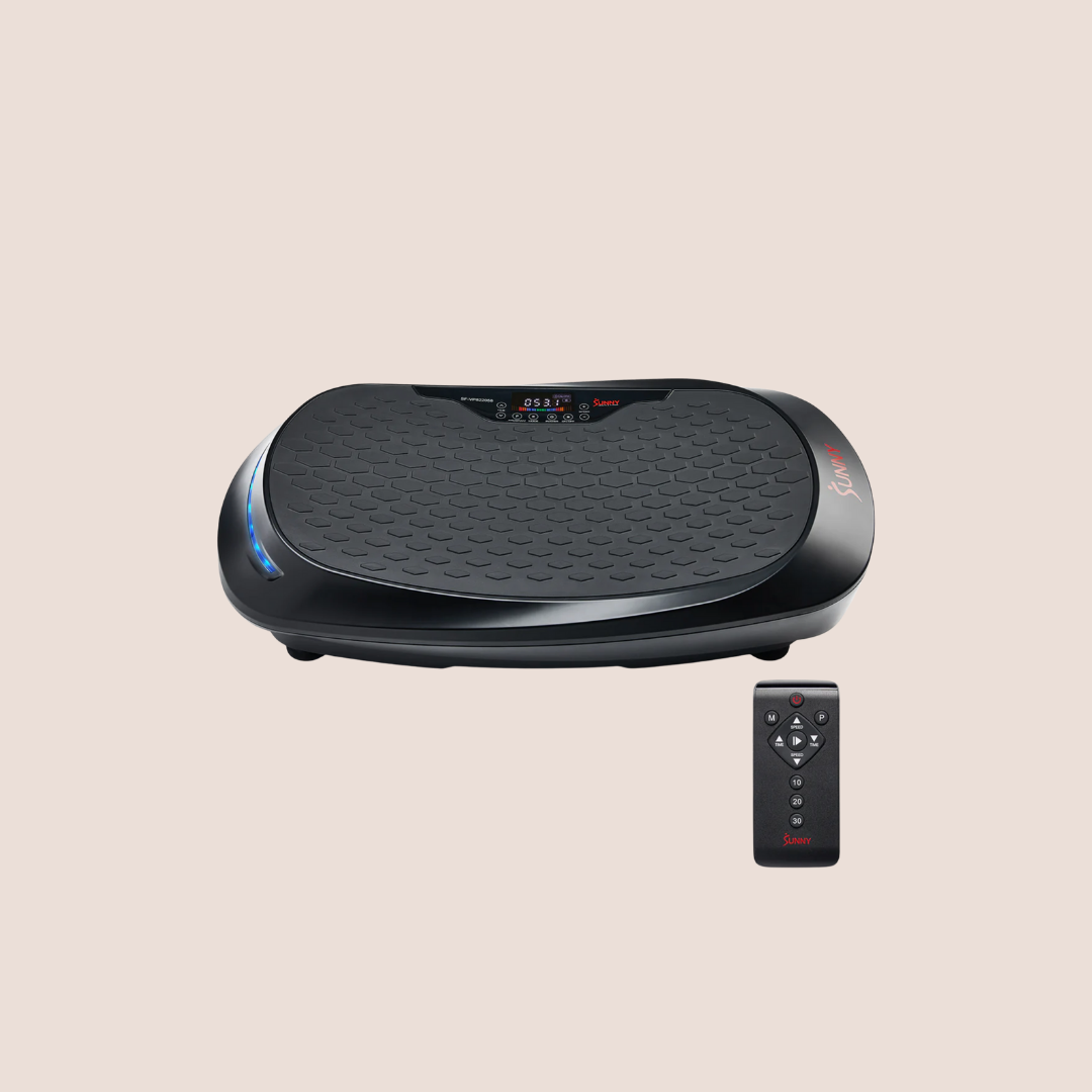 Black vibration plate exercise machine with textured surface and digital display, shown with a remote control, on a neutral background—an ideal companion for recovery routines alongside massage guns.