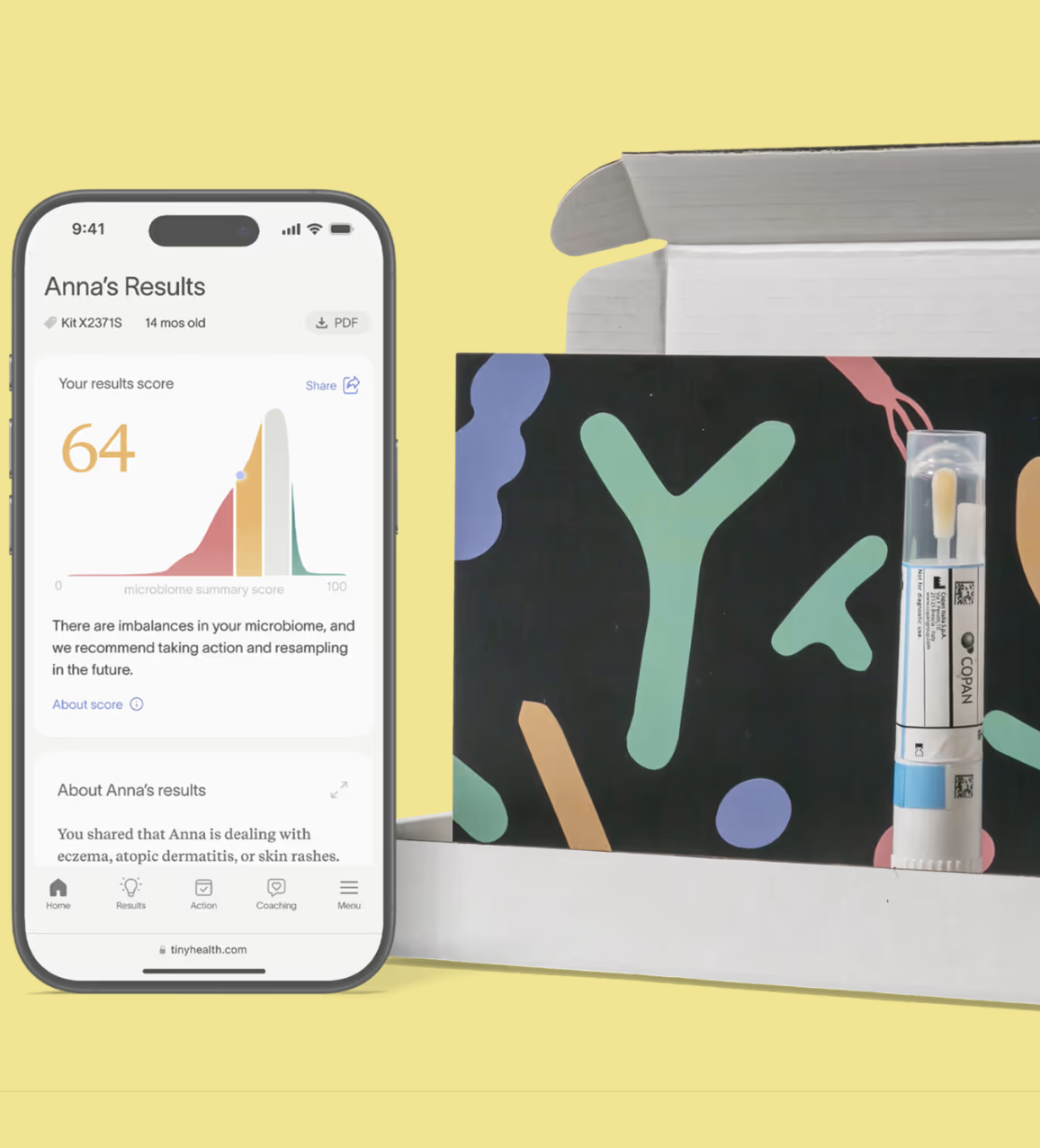 A smartphone displays microbiome test results with a score of 64, shown next to a test kit and collection swab in an open box against a yellow background—perfect for wellness enthusiasts seeking insights beyond massage guns.